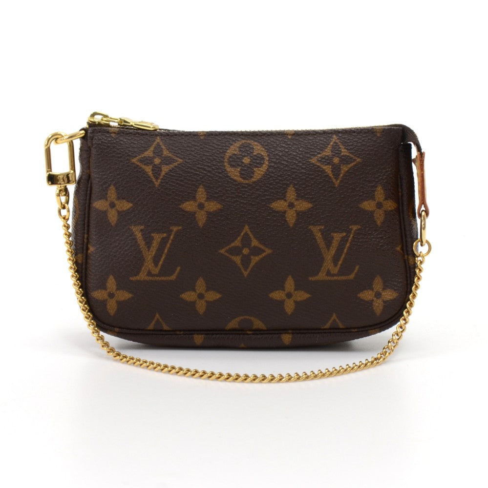 Louis Vuitton Limited Edition Monogram Canvas Illustre Mini Accessories  Pochette Bag - Yoogi's Closet