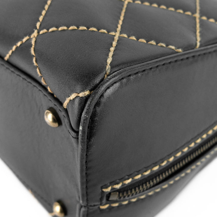 surpique top handles calfskin leather bowler bag