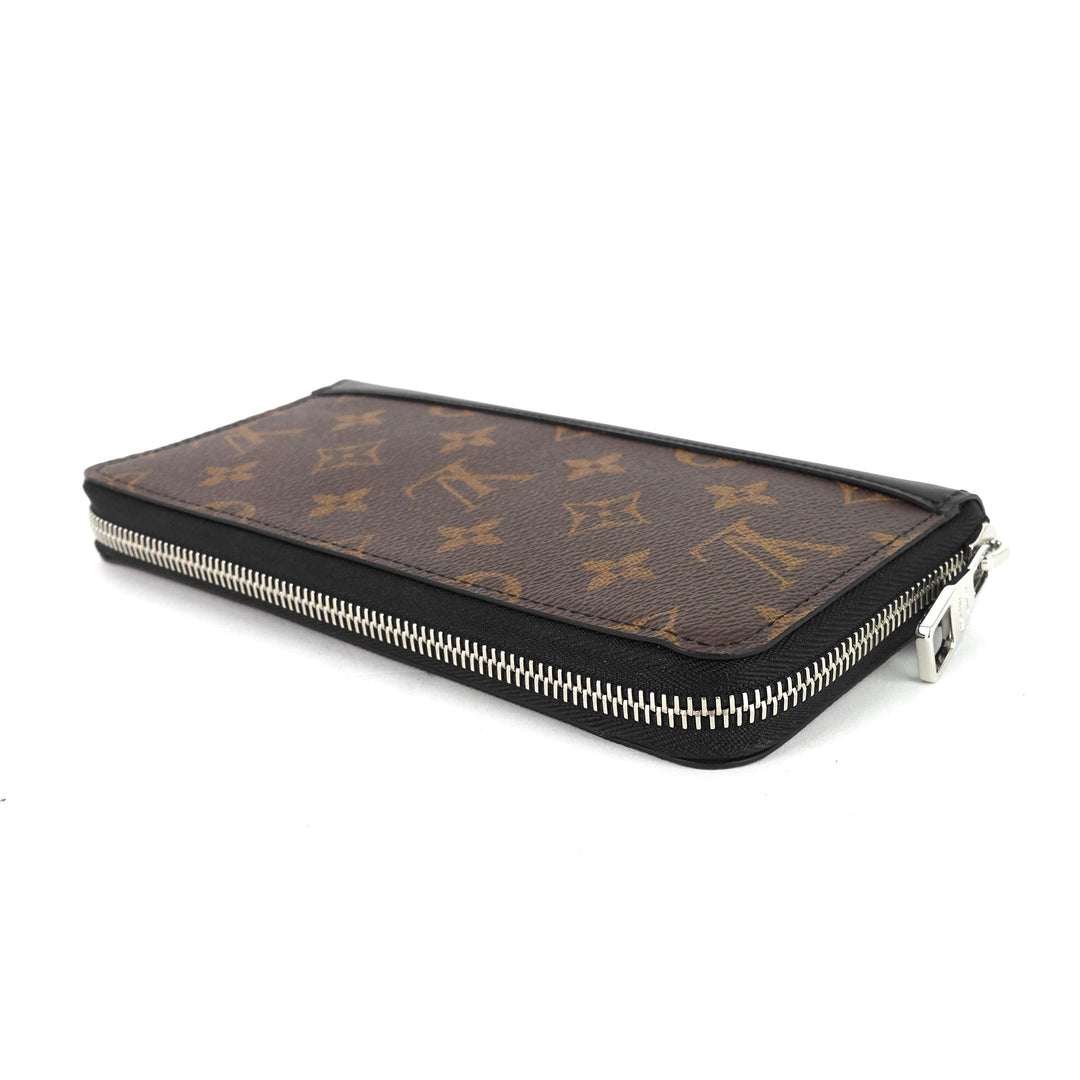 zippy monogram macassar canvas vertical bifold wallet