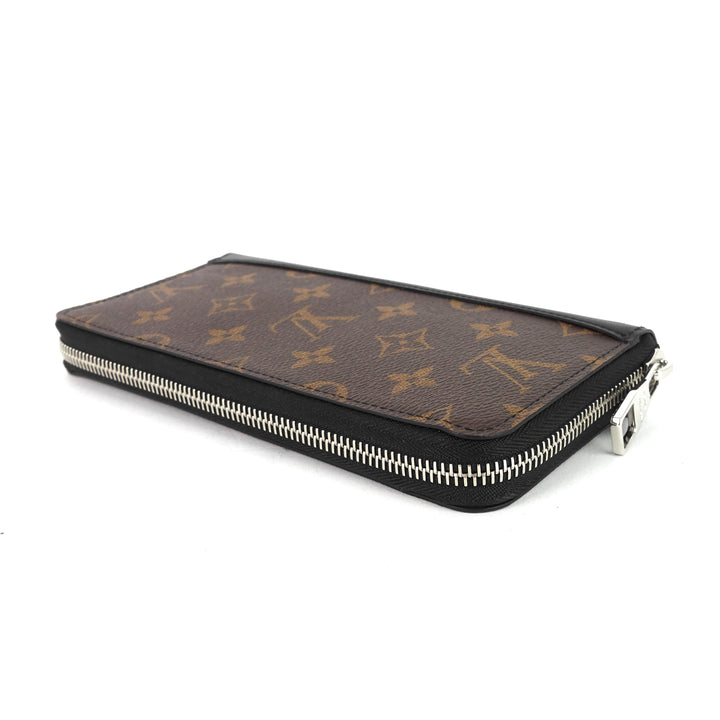 zippy monogram macassar canvas vertical bifold wallet